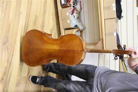 A cello and two bows, cello height 123cm
